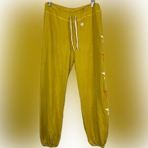 NWT Anthropologie Sundry  mustard yellow with orange and white star sweatpants S